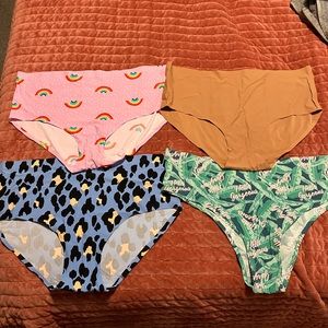 Four pairs of XL Cheek Boss panties